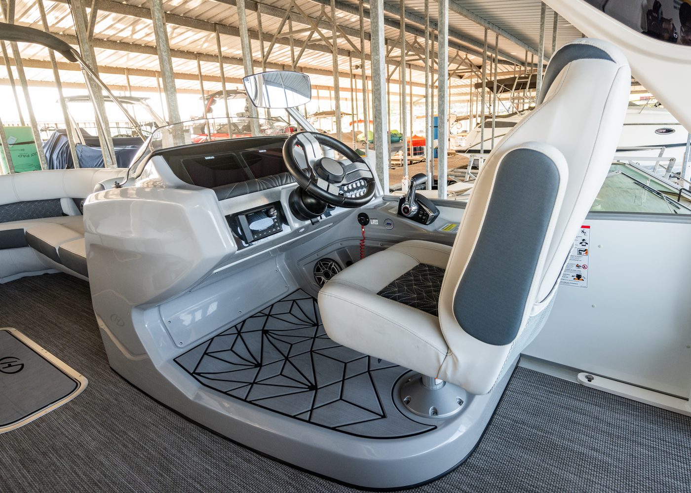 Captain's helm with Harris dashboard and key